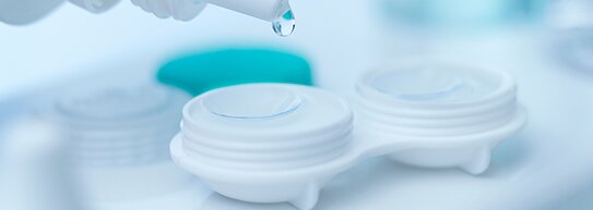 Contact lens and solution