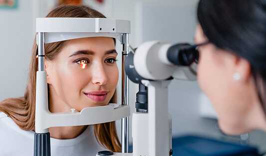 woman taking LASIK eye exam