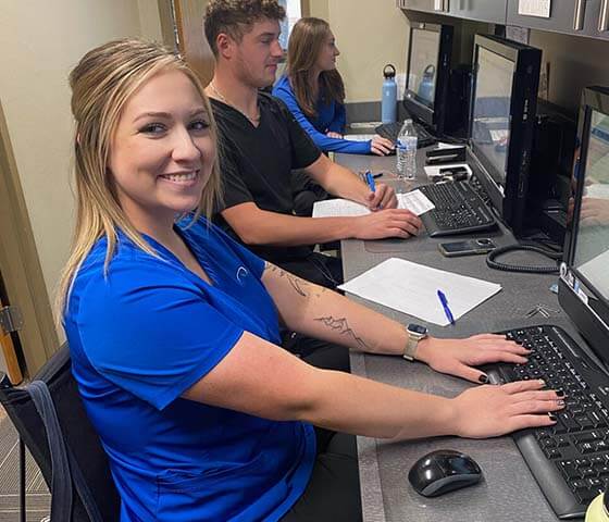 staff using computer at Missouri Eye Consultants