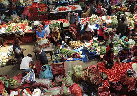 People buying at the public market
